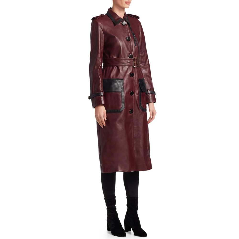Stylish women's long trench leather coat with a belt, crafted from real lambskin, featuring a spread collar and button closure in burgundy and black.