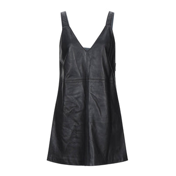 Front view of a black leather mini dress featuring wide shoulder straps, a deep V-neckline, and a slight A-line silhouette. Subtle seam detailing is visible.